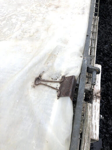 Step 4: Using trusty binder clips to hold the plastic in place. 